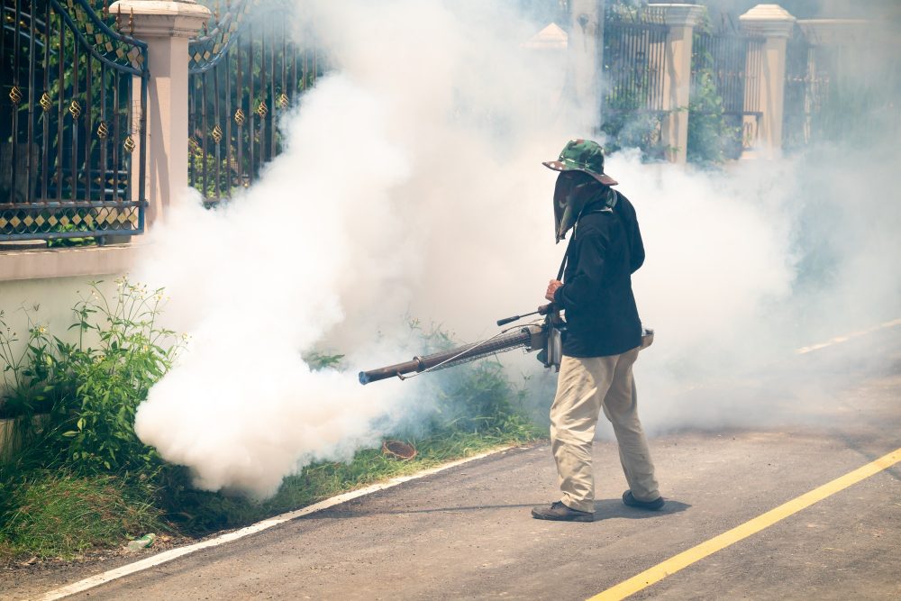man use fumigation mosquitoes machine for kill mosquito carrier of Zika virus and dengue fever